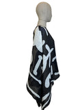 Pleats Please by Issey Miyake black and white poncho